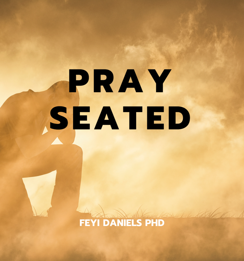 Pray seated Feyi